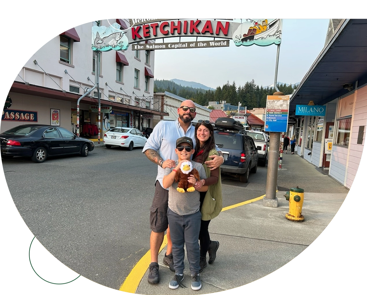 A family poses for the camera in ketchikan.